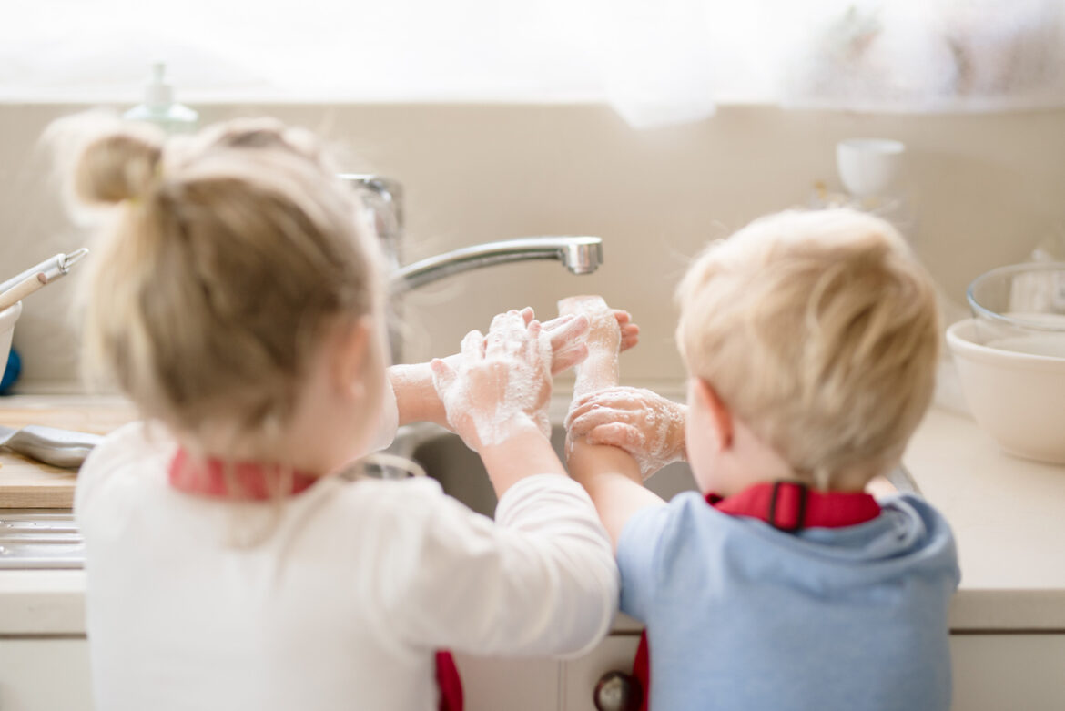 Washing up at the kitchen sink